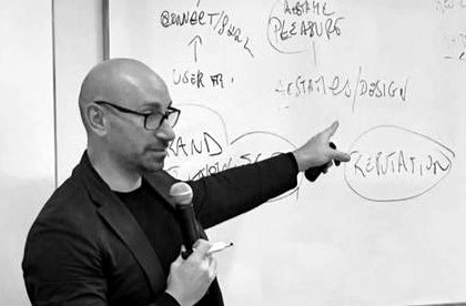 Francesco Massara teaching, at the whiteboard